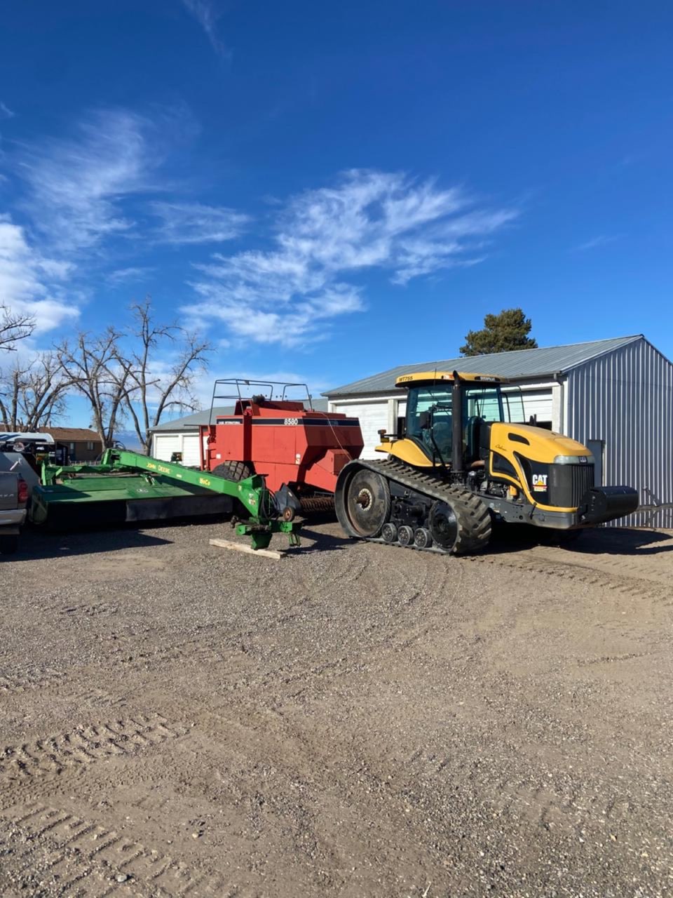 Hay cutting and large square baling crew in Weld County